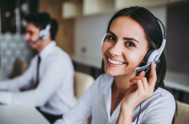 Man and woman wearing headsets
