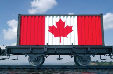 Containers with the flag of Canada. Railway transportation. 3d rendering