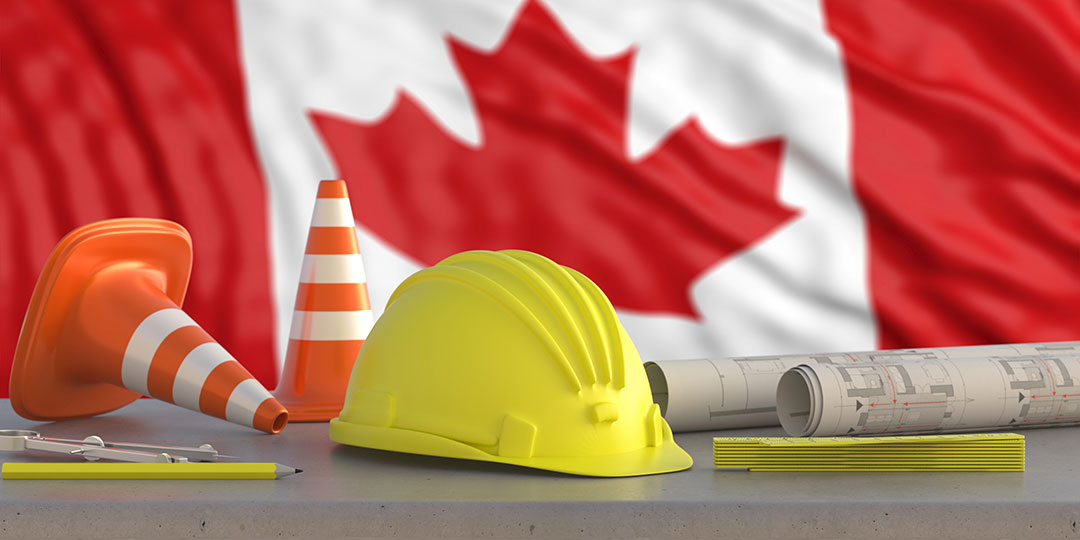 Yellow hardhat with the Canadian flag in the background