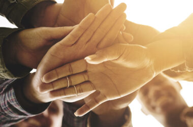 People, hands and outdoor stacked for support