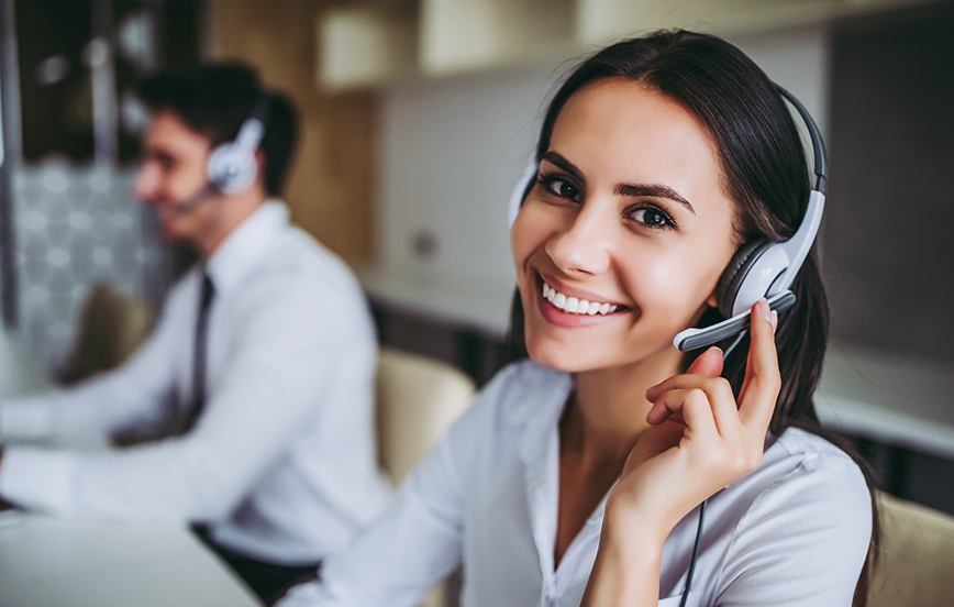 Man and woman wearing headsets