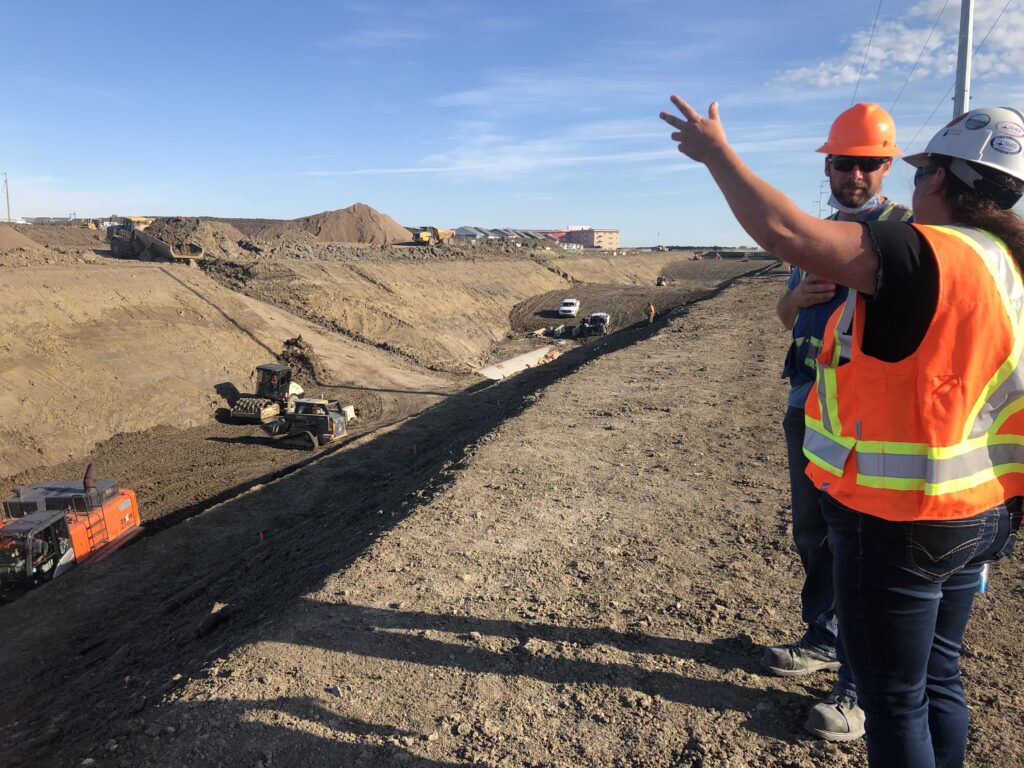 Murray Macala and company safety manager discuss a project