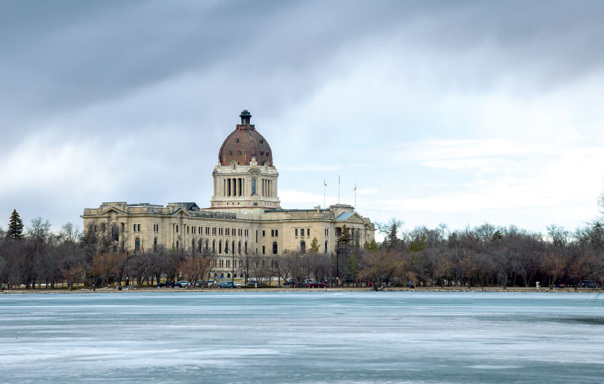 The Saskatchewan Legislative building as seen from the shore of Wascana Lake in Regina, Saskatchewan.