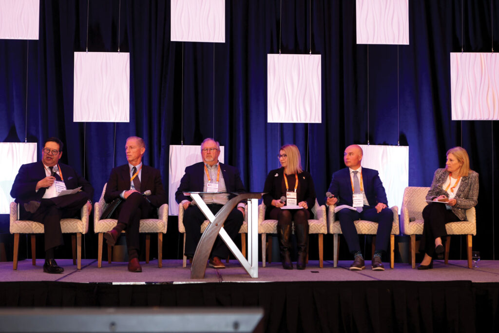 Panel of people on stage