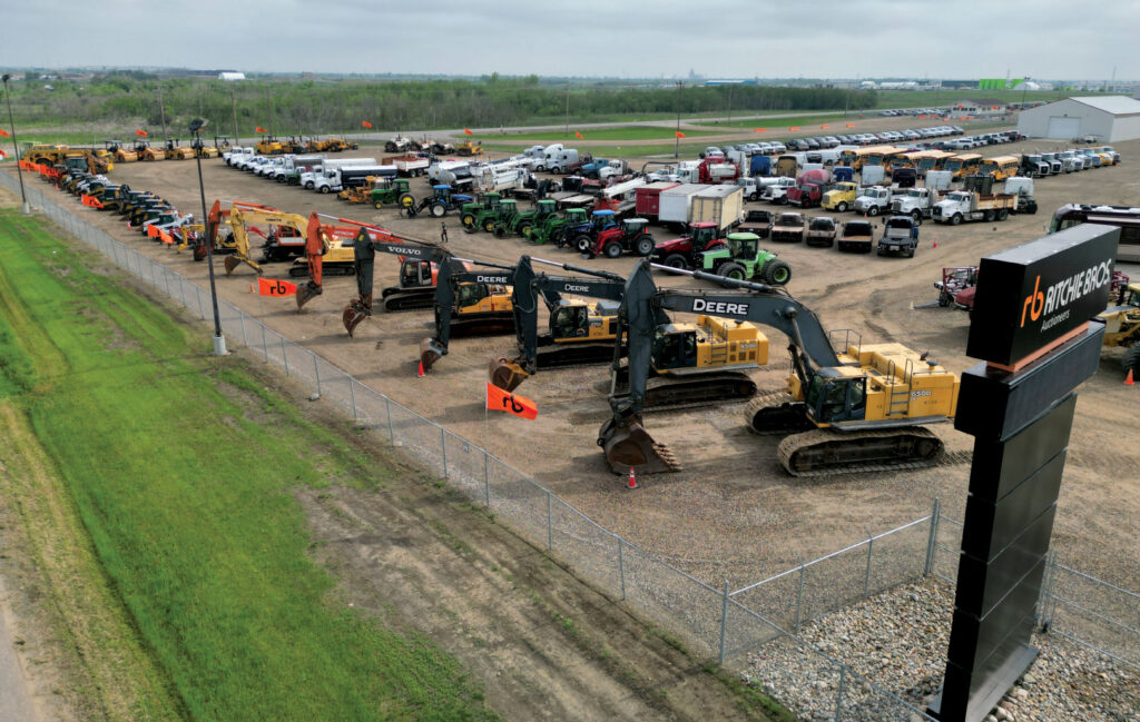 Rows of vehicles in Ritchie Bros. Auctioneers compound