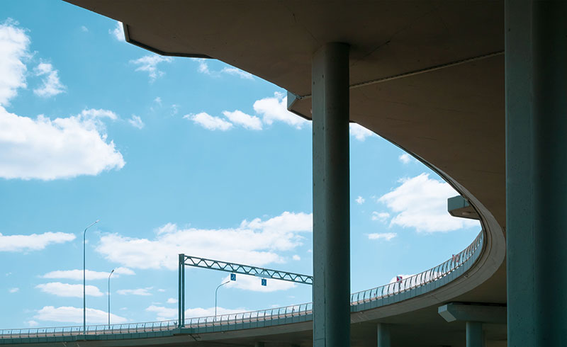 A fragment of a large bridge overpass with communications