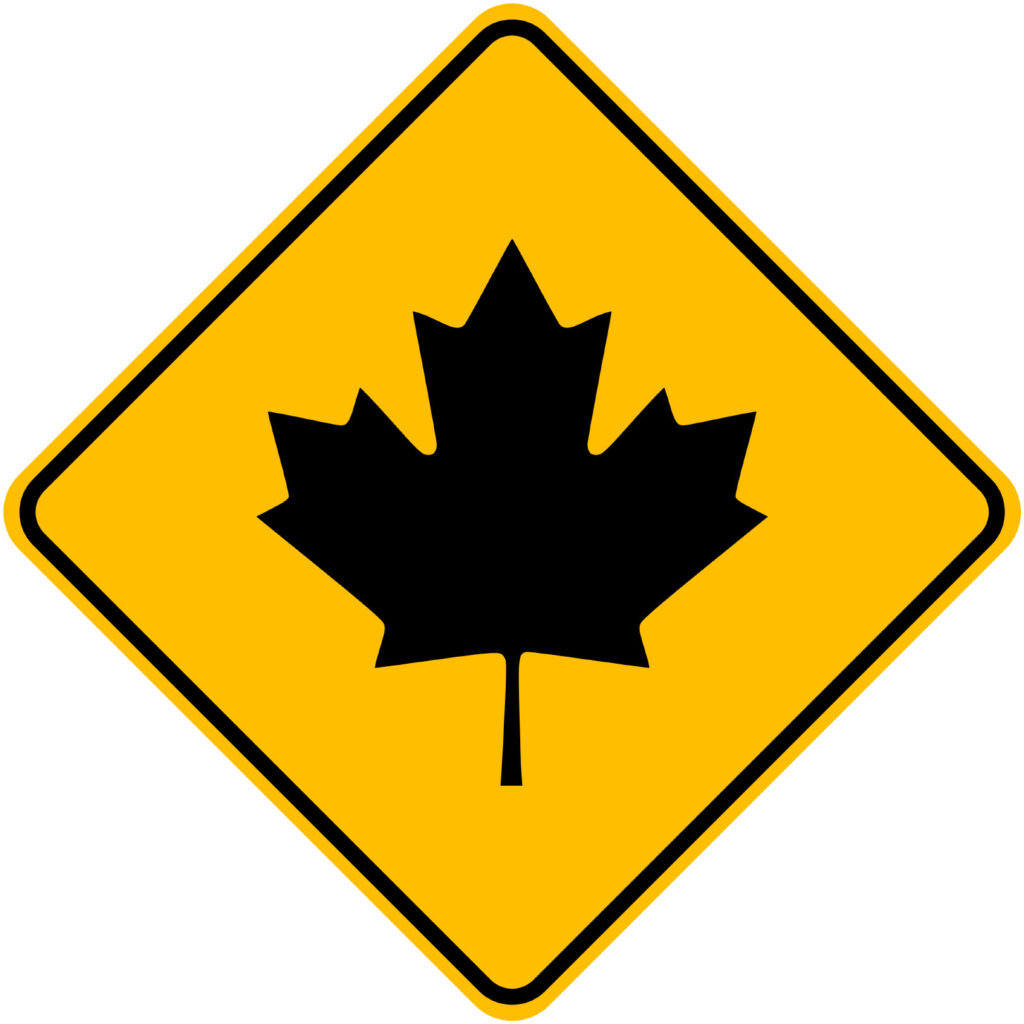 Black maple leaf on yellow road sign