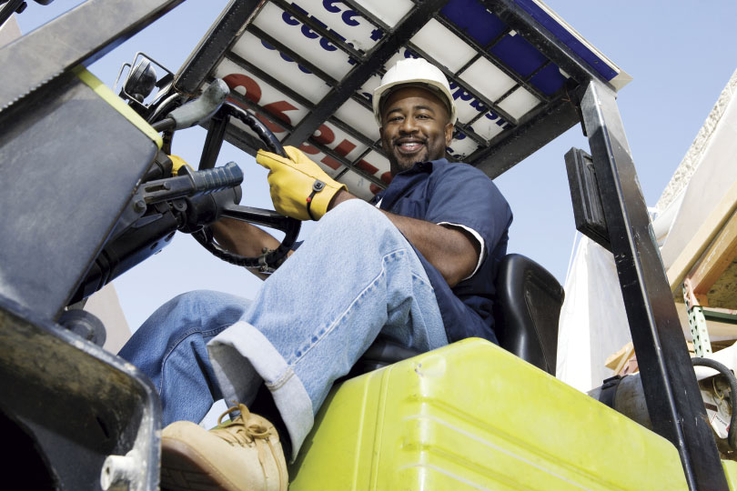 Equipment operator smiling
