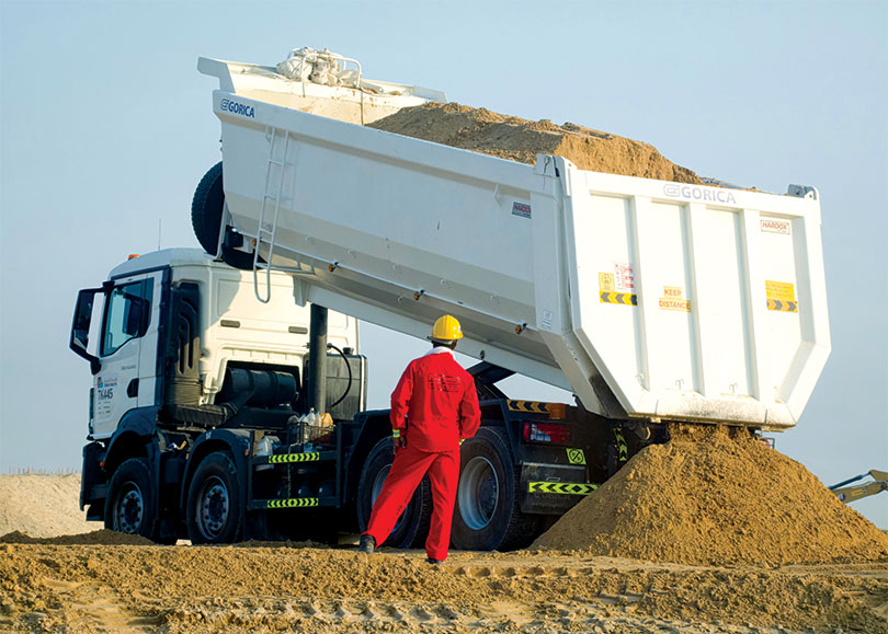 Unloading aggregates from dump truck
