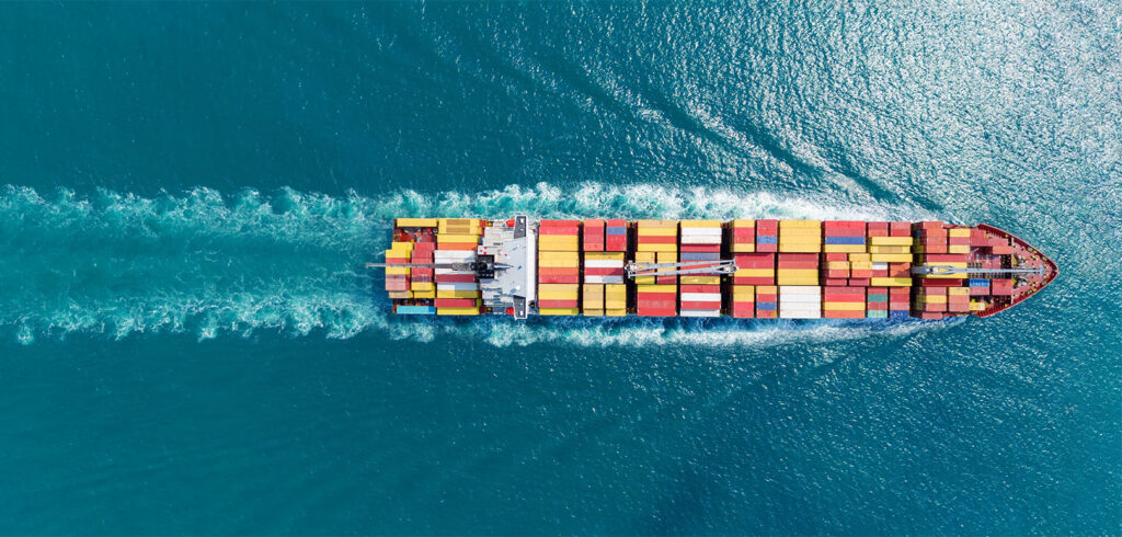 Express Cargo Container Ship with contrail in the ocean ship carrying container