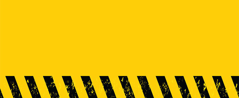Black safety marks on yellow background